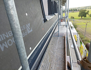 Zateplení bytového domu pomocí foukané izolace